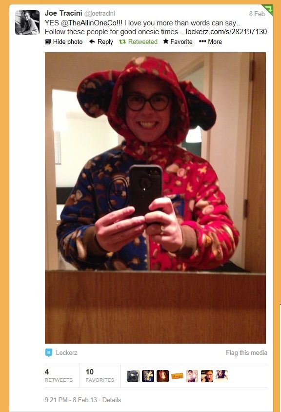 Joe Tracini in his Red and Blue Cheeky Monkey Onesie