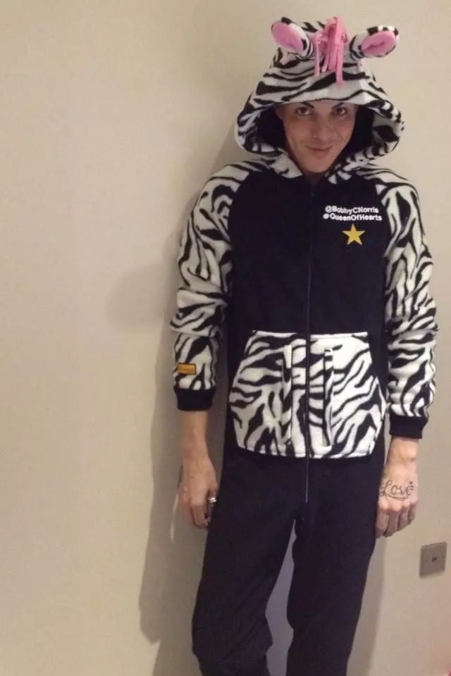 Bobby C Norris shows off his #ZebraStyle Onesie from The All-in-One Company